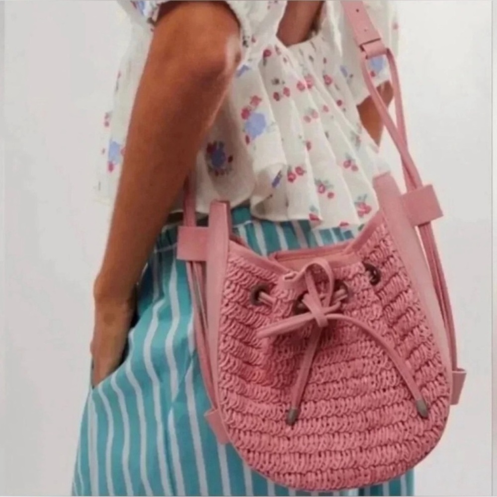 Free People Cabana Woven Drawstring Crossbody Bag in Pink
